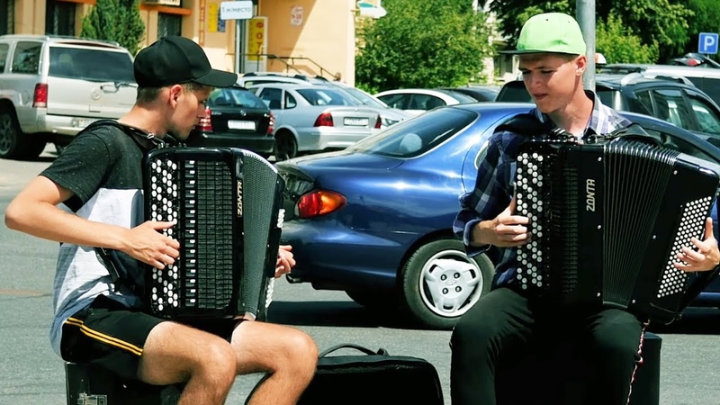 Curly maple, carved leaf this is a duet of street musicians, they play from the