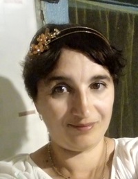Оля Тихонова